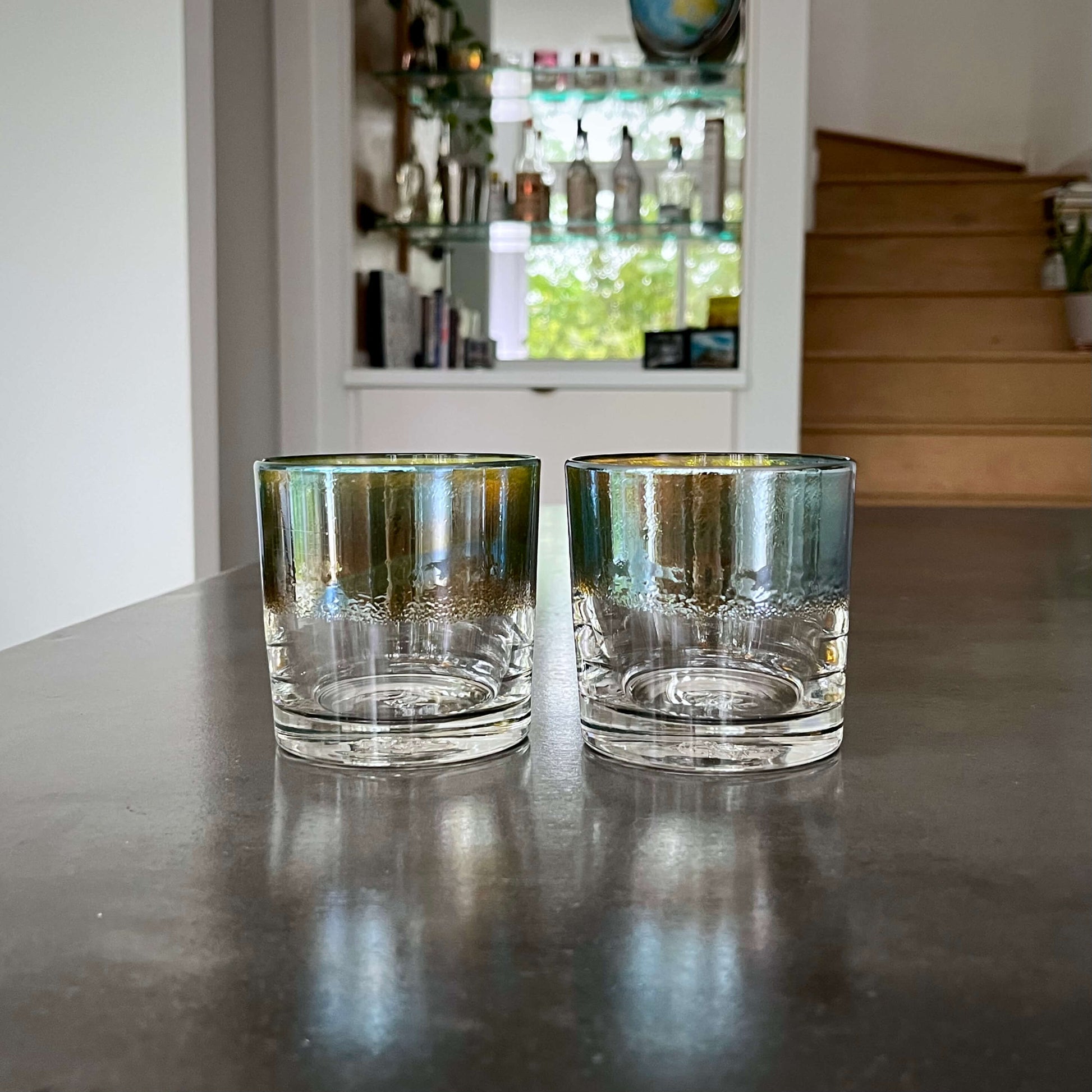 https://shop.bourbonbanter.com/cdn/shop/products/Antique-Silver-Whiskey-Glasses-Teal-Gold-Bar.jpg?v=1650374601&width=1946